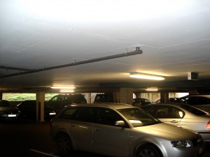 Colour photograph showing the basement car park in a hospital. Click this photograph, and the photographs below, to enlarge.