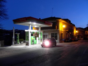 Colour photograph showing our hired car stopped in front of a Petrol Station in Amandola, Le Marche, Italy ... just as we were leaving, at dawn, to drive back to Rome. Photograph taken by CJ Walsh. 2012-04-10. Click to enlarge.